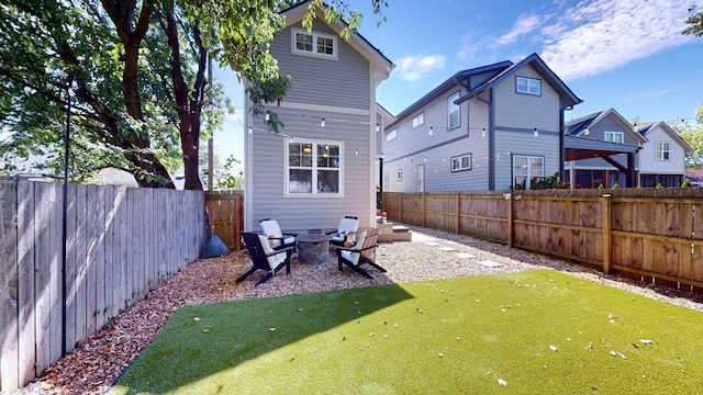 view of yard with a fire pit