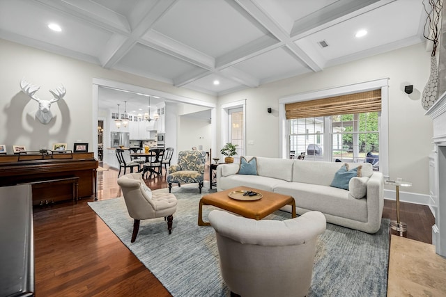 living room with beam ceiling, coffered ceiling, and dark hardwood / wood-style floors