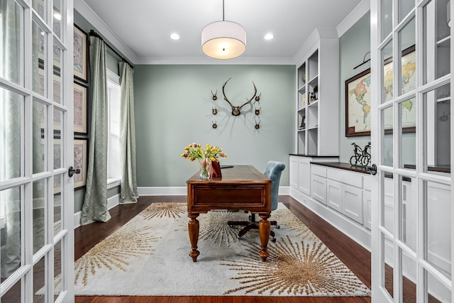 home office featuring french doors, built in shelves, crown molding, and dark wood-type flooring