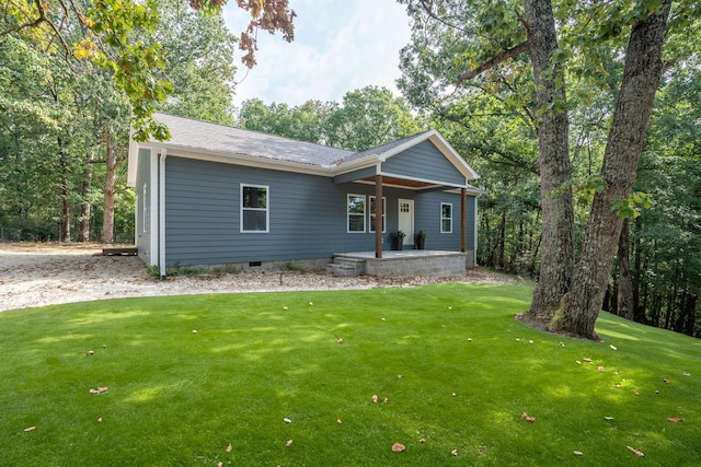 view of front of home with a porch and a front yard