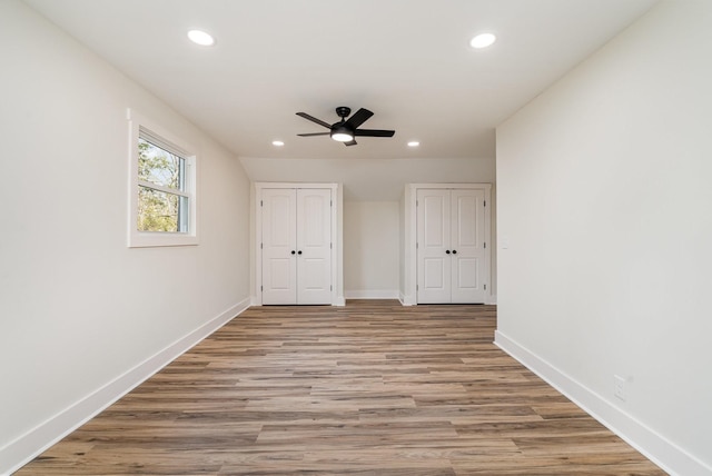 interior space with ceiling fan and light wood-type flooring