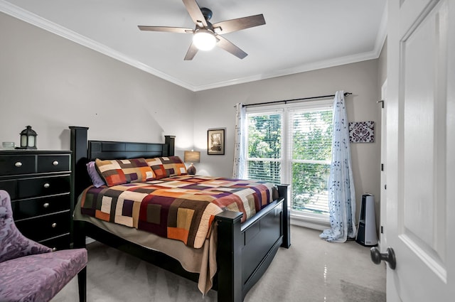 bedroom featuring ceiling fan and crown molding