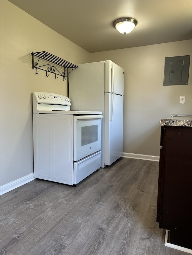 washroom featuring electric panel and hardwood / wood-style flooring