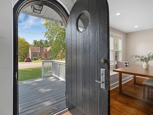 entryway with dark wood-type flooring