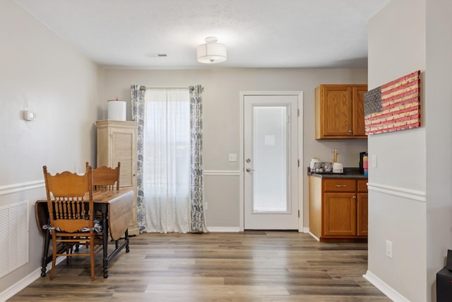 kitchen featuring dark hardwood / wood-style floors