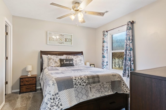 bedroom with ceiling fan and carpet