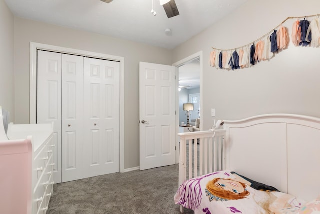 carpeted bedroom featuring a closet and ceiling fan