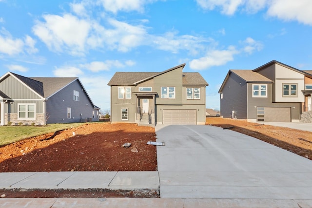 view of front of property with a garage