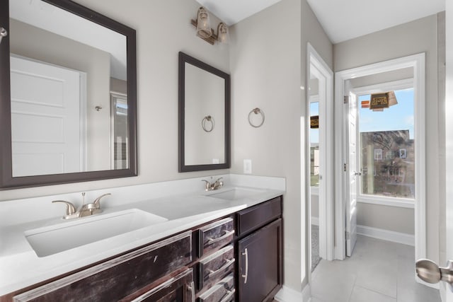 bathroom with vanity and tile patterned floors