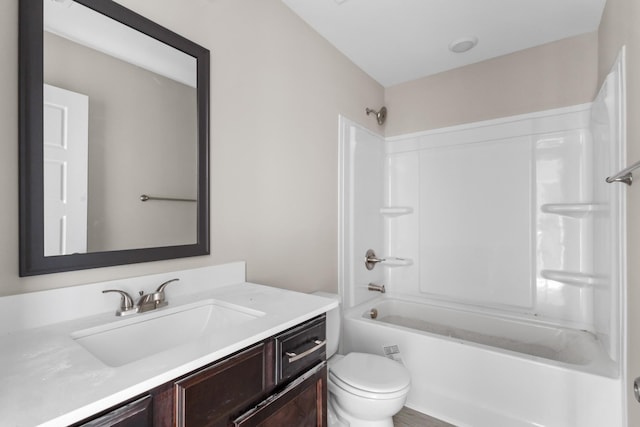 full bathroom featuring toilet, shower / tub combination, and vanity