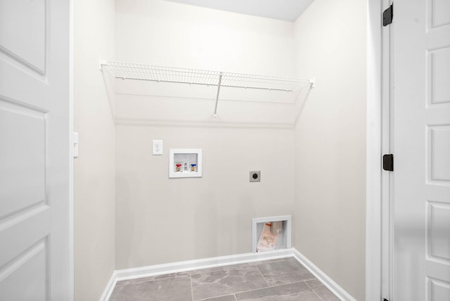 clothes washing area with hookup for a washing machine and hookup for an electric dryer