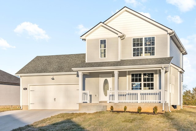 view of front of property with a front yard, a garage, and a porch