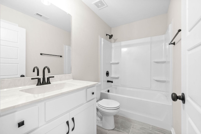 full bathroom featuring toilet, bathing tub / shower combination, tile patterned floors, and vanity