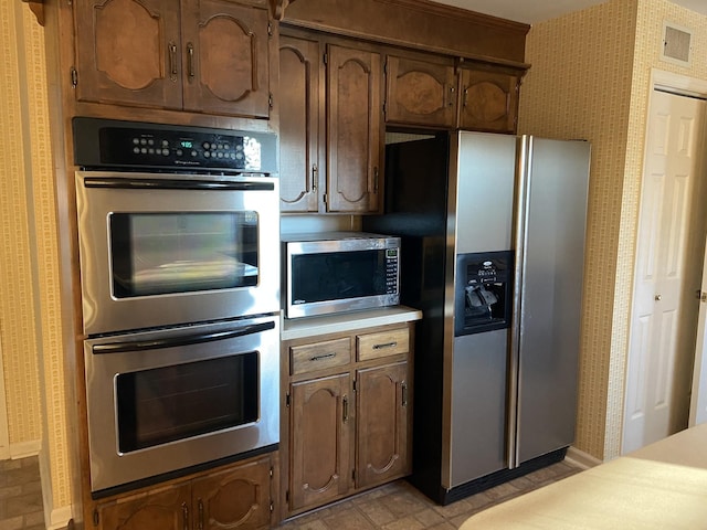 kitchen featuring appliances with stainless steel finishes