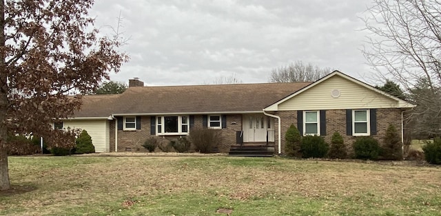 ranch-style home with a front yard