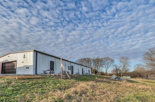 view of outbuilding featuring a garage