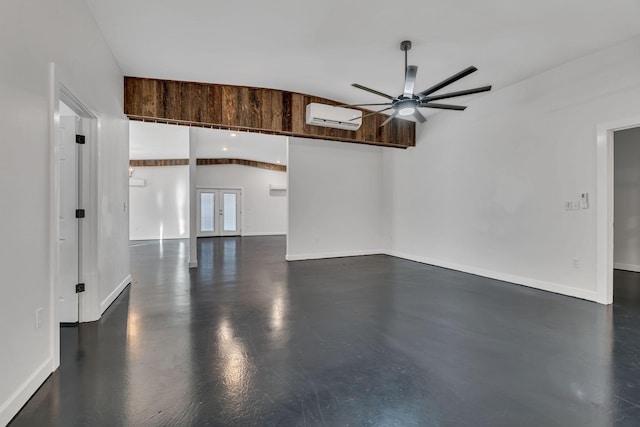 empty room with ceiling fan and a wall unit AC