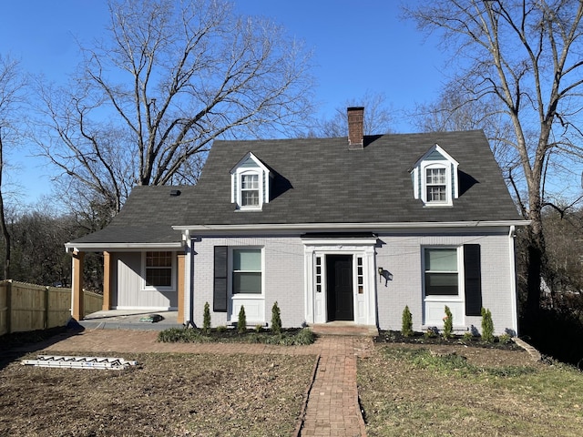 view of new england style home