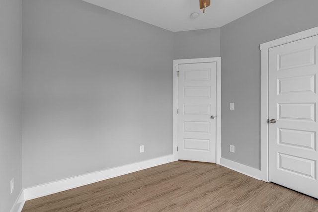 empty room with light wood-type flooring