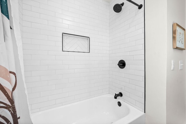 bathroom with shower / bathtub combination with curtain