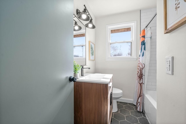 full bathroom with toilet, tile patterned flooring, shower / bath combination with curtain, and vanity