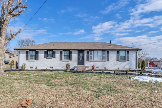 ranch-style house with a front lawn