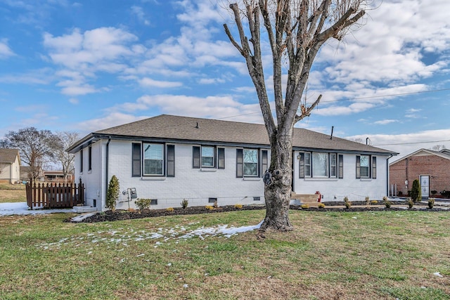 ranch-style house with a front yard