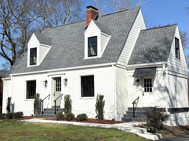 view of new england style home