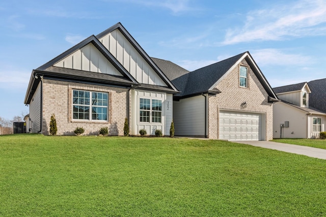 view of front of house with a garage and a front lawn