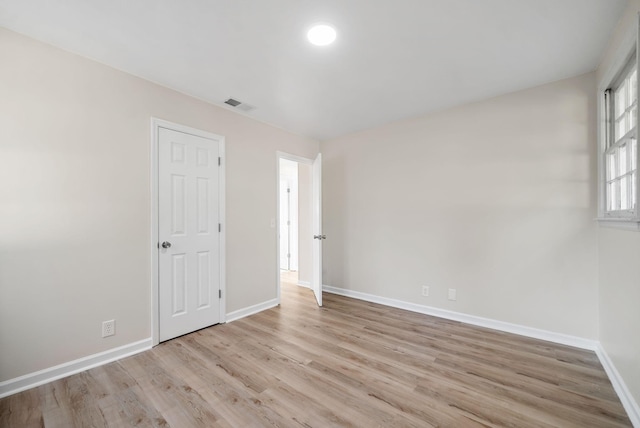 unfurnished bedroom with light hardwood / wood-style floors