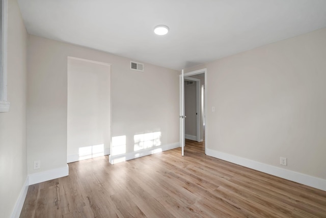 empty room featuring light hardwood / wood-style floors