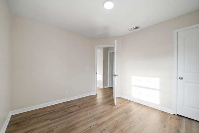 unfurnished bedroom with light hardwood / wood-style floors