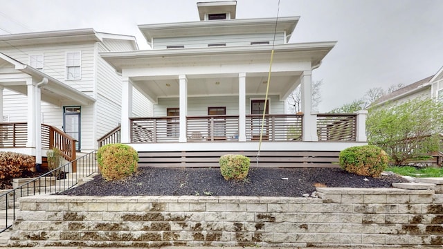 view of front of home featuring covered porch