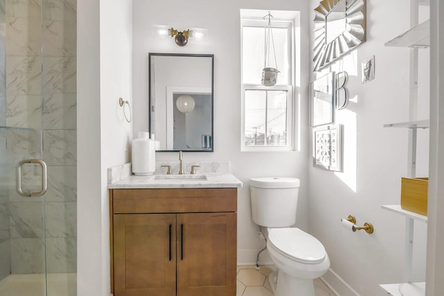 bathroom featuring toilet, tile patterned flooring, an enclosed shower, and vanity