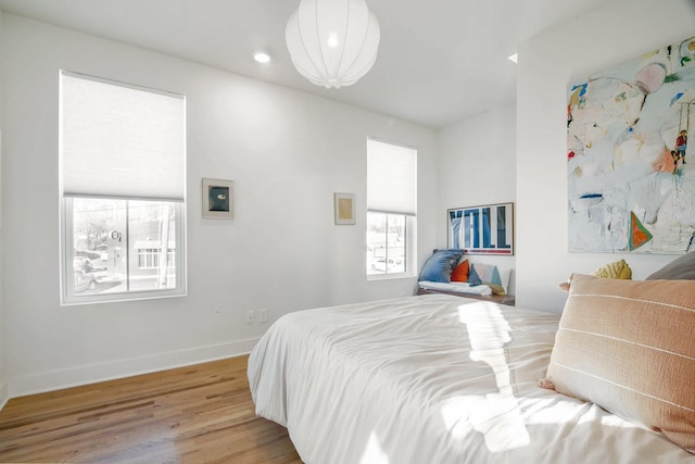 bedroom with light wood-type flooring