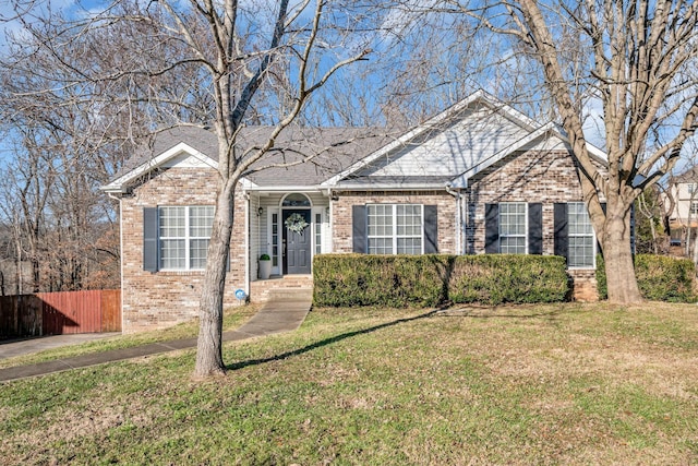 view of front of home with a front lawn