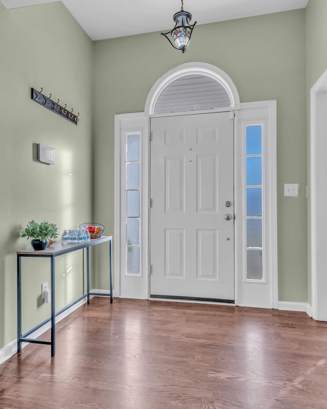 entrance foyer with hardwood / wood-style floors