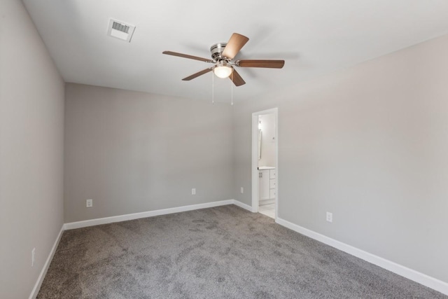 carpeted empty room with ceiling fan