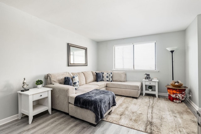 living room with light hardwood / wood-style floors