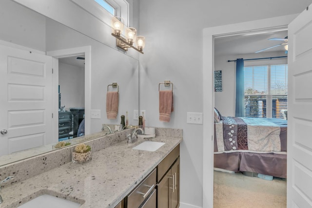 bathroom featuring ceiling fan and vanity