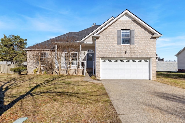 view of front facade featuring a front yard and a garage