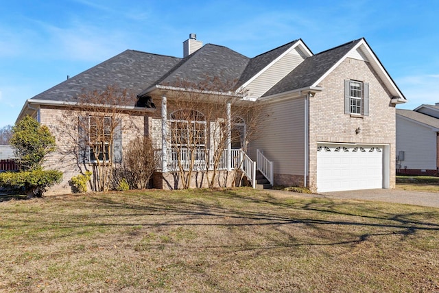 view of front property with a garage and a front lawn