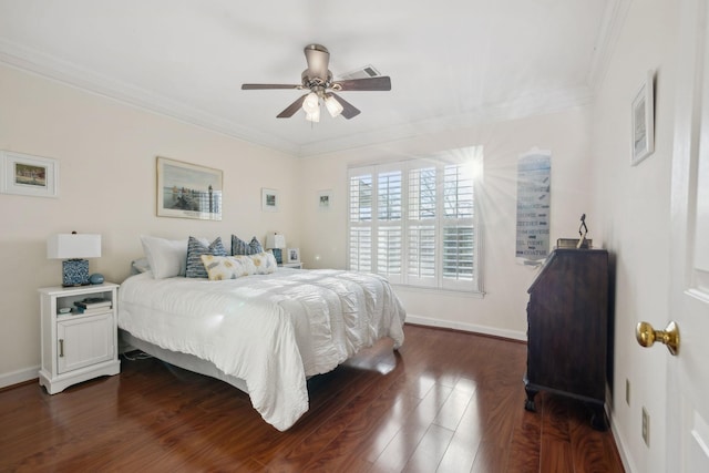 bedroom featuring ornamental molding, dark wood-type flooring, and ceiling fan