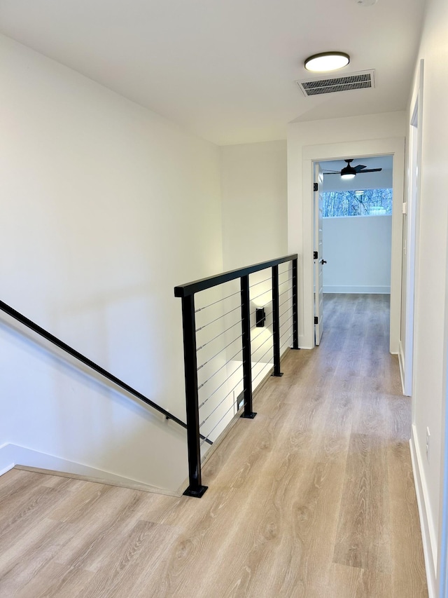 corridor featuring light wood-type flooring