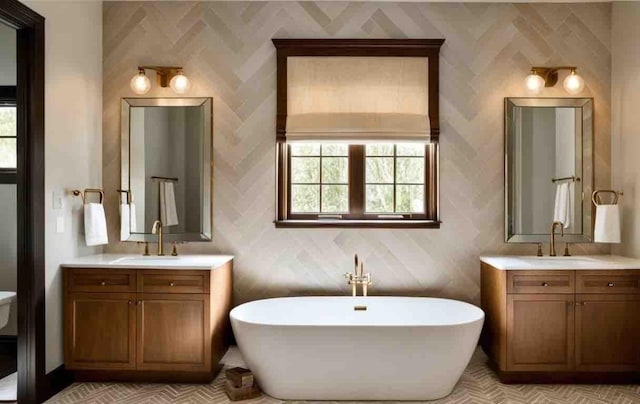 bathroom with vanity and a bathing tub