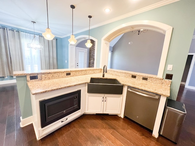 kitchen featuring sink, pendant lighting, stainless steel dishwasher, and light stone counters