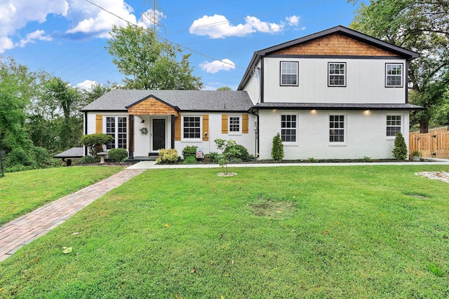 view of property featuring a front yard