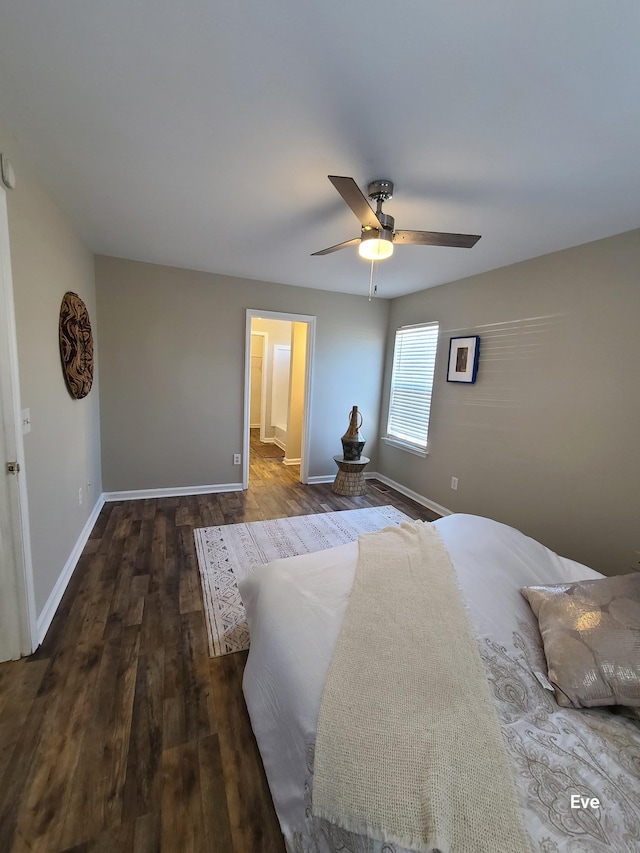 unfurnished bedroom featuring dark wood-type flooring and ceiling fan