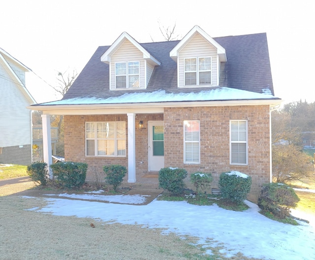 view of front of home featuring covered porch