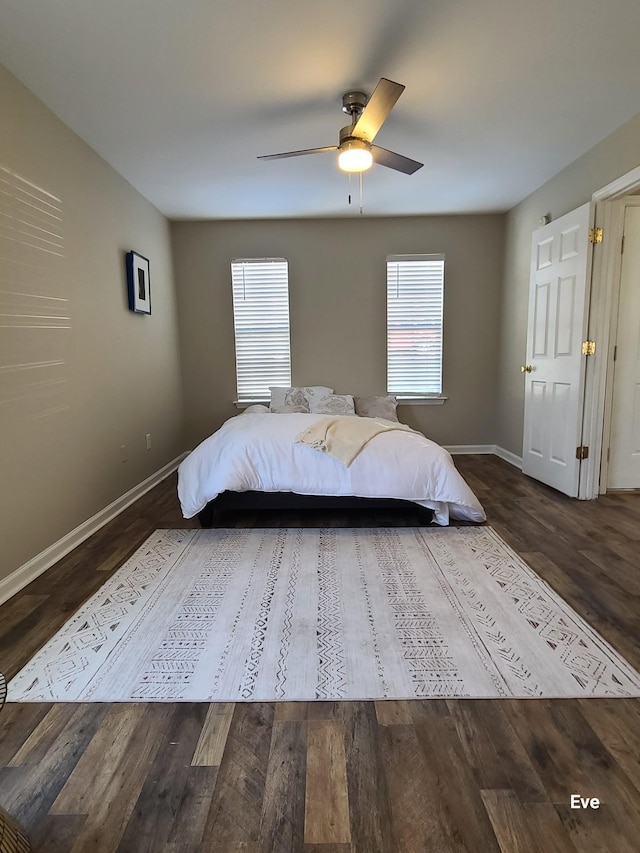 unfurnished bedroom with dark wood-type flooring and ceiling fan